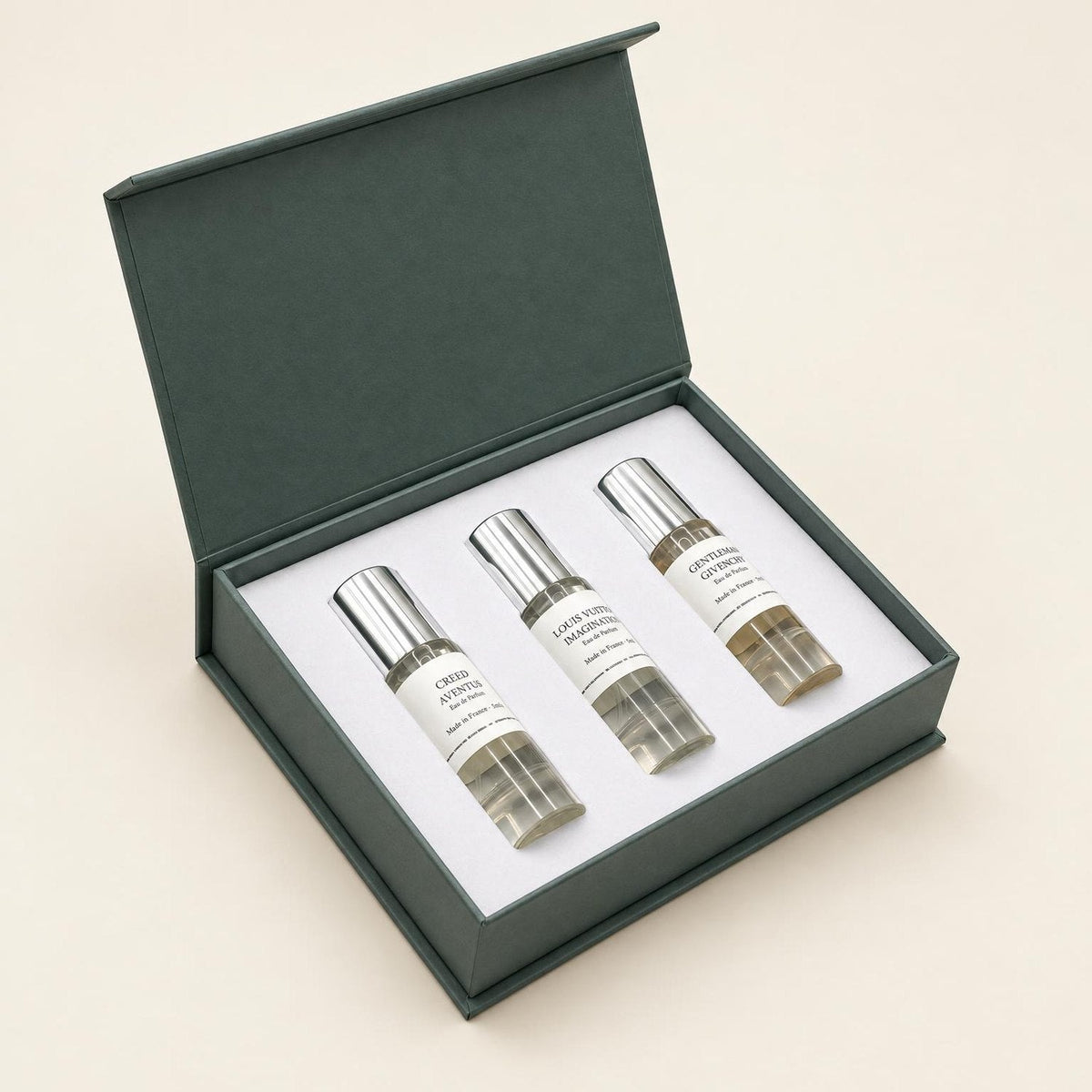 Open Base Note gift box with three 5ml vials: Creed Aventus, Louis Vuitton Imagination and Givenchy Gentleman