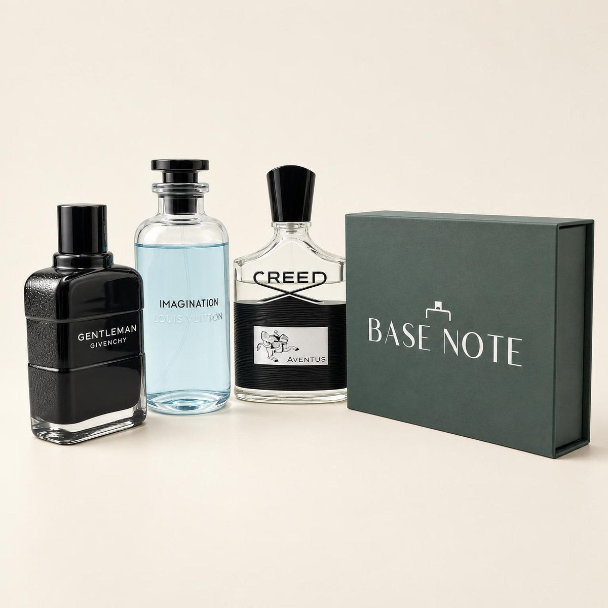Givenchy Gentleman, Louis Vuitton Imagination and Creed Aventus bottles beside a closed Base Note gift box